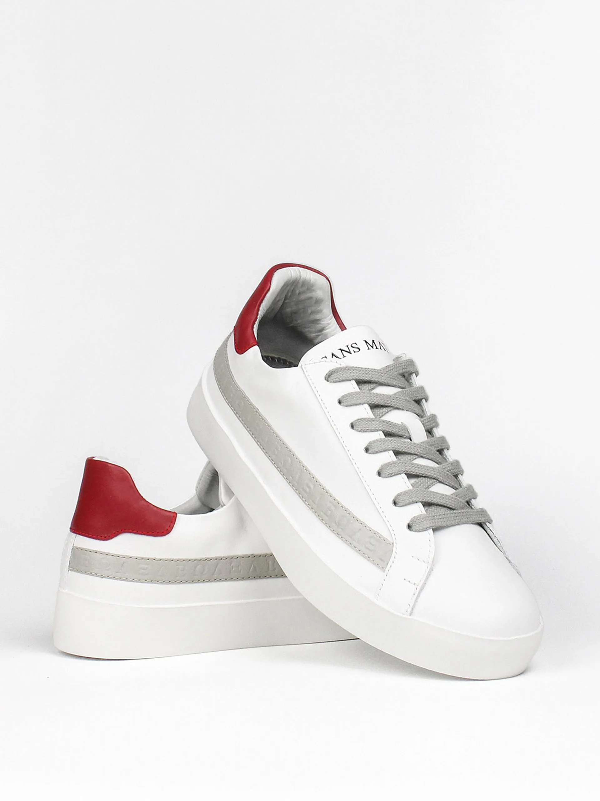 The SJC trainers in white and red