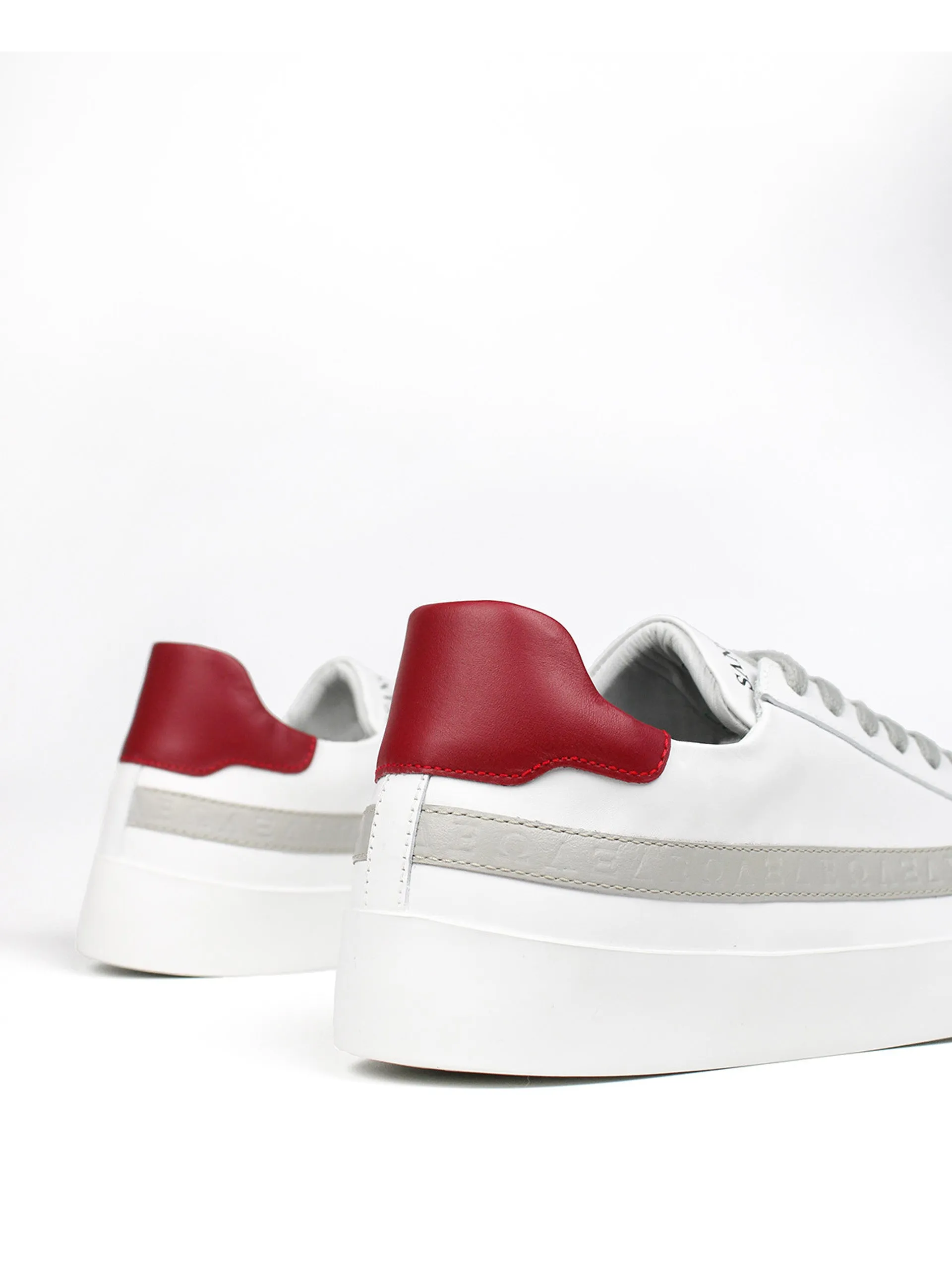 The SJC trainers in white and red